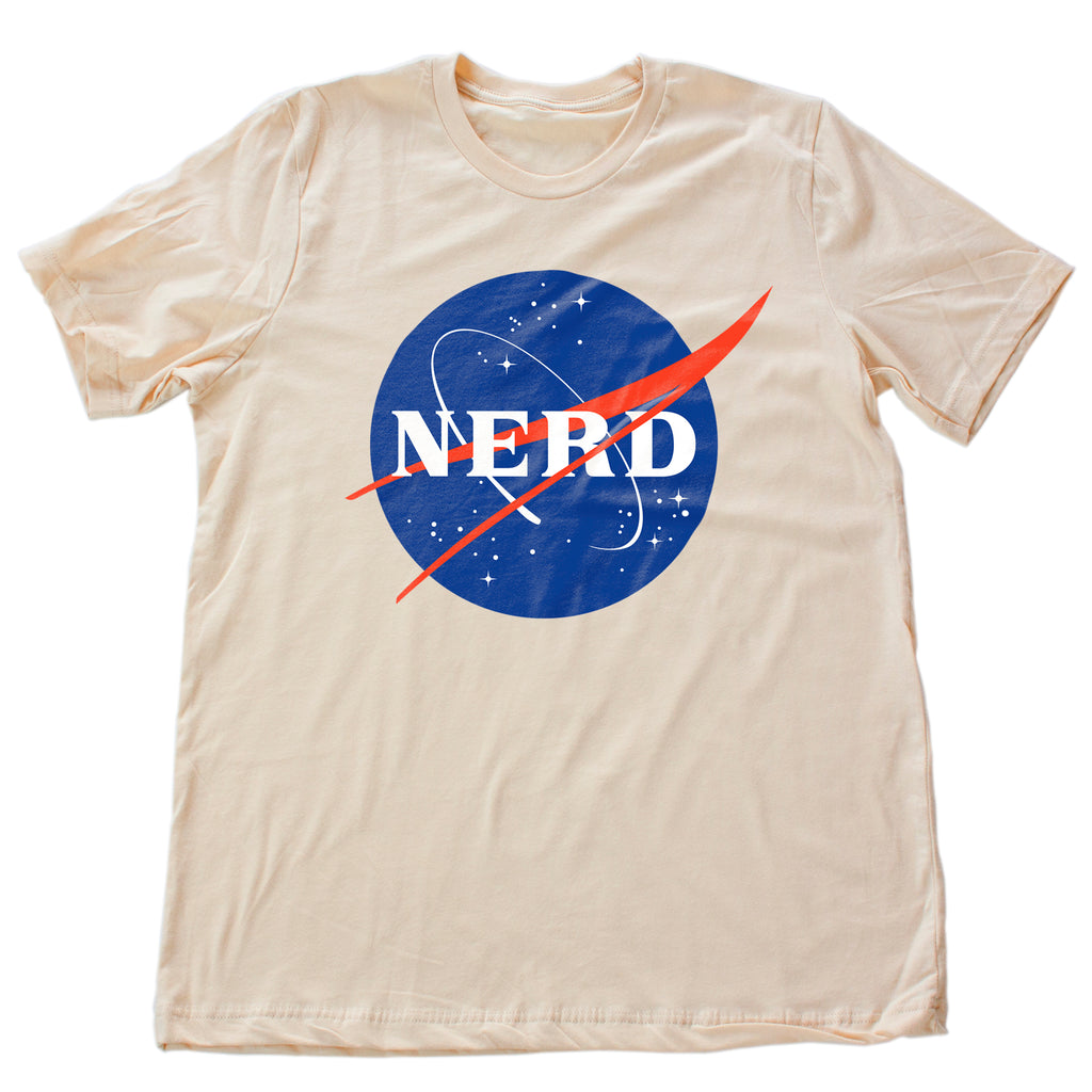 Classic, retro graphic t-shirt featuring a sarcastic parody of the vintage NASA universe logo, but in this instance it reads "NERD" instead of NASA, to proudly own one's geekdom, intelligence, and self-deprecating wit.