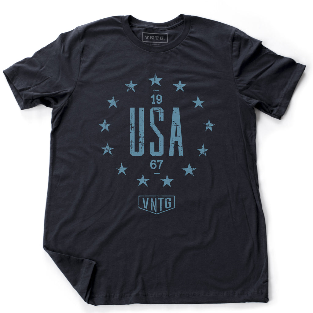 Classic, distressed, retro-design graphic t-shirt with "USA" in bold type and 13 stars circling it. From the brand VNTG.