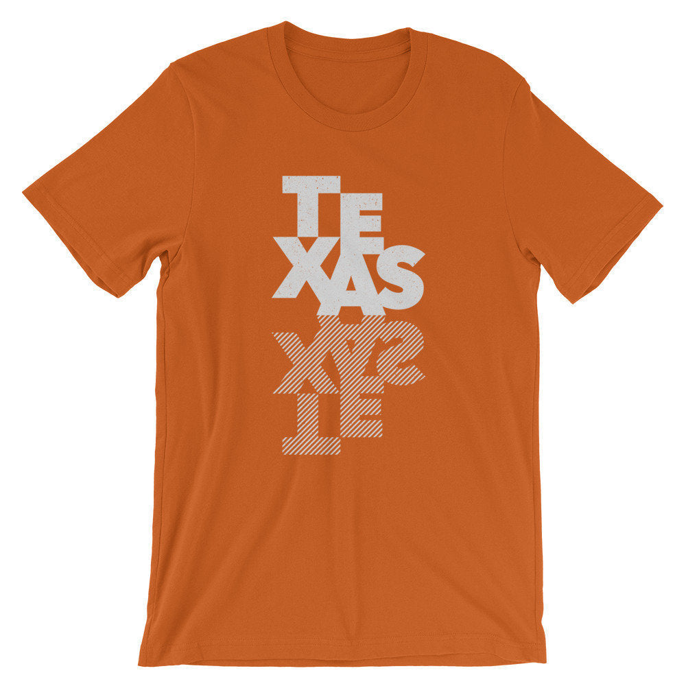 Bold, fashionable graphic t-shirt with the name "TEXAS" and its cross-hatched mirror reflection.