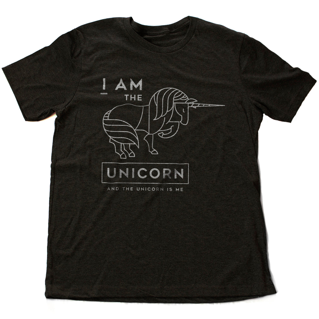 Elegant graphic t-shirt featuring a humorous, sarcastic image of a proud Unicorn, and the text "I am the Unicorn," to celebrate one's uniqueness and personal power.