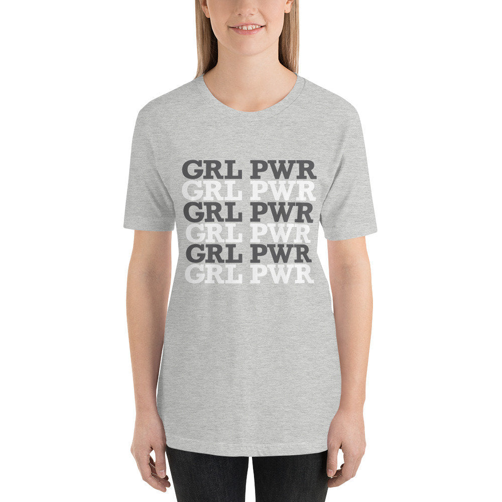 Elegant retro graphic t-shirt with repeating GIRL POWER text, typographically set as GRL PWR, alternating in black and white.
