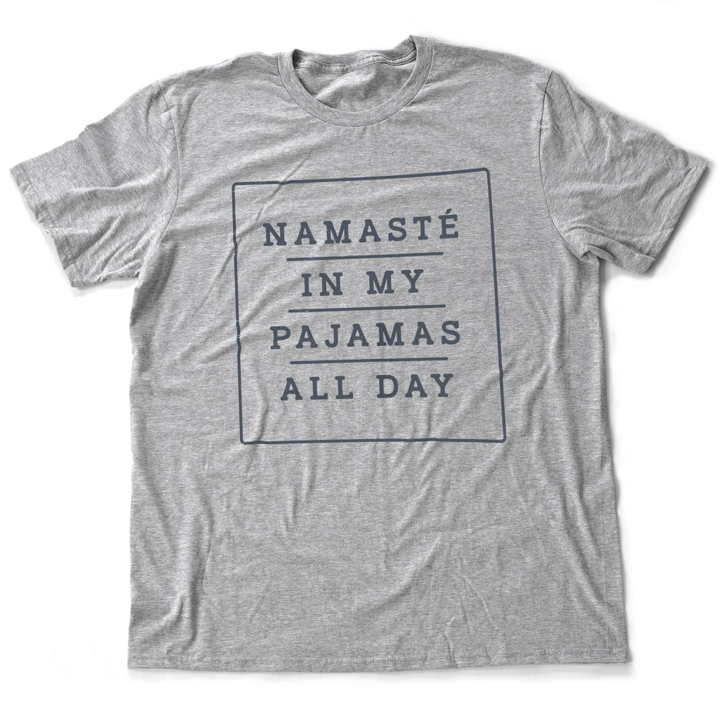 Graphic t-shirt based on the yoga meme, with classic, bold text that reads: "Namaste in my pajamas all day"