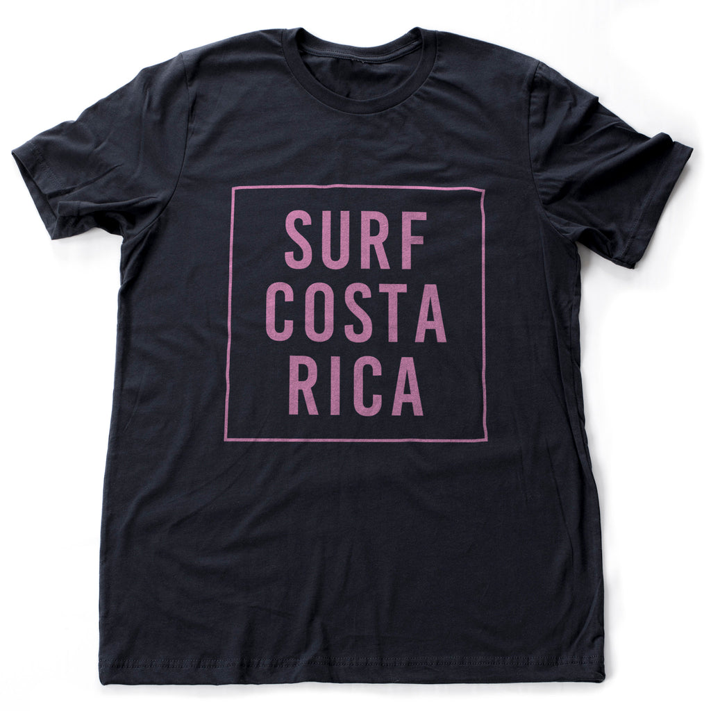 Stylish graphic t-shirt with a retro "SURF COSTA RICA" typset in a bold font within a box.