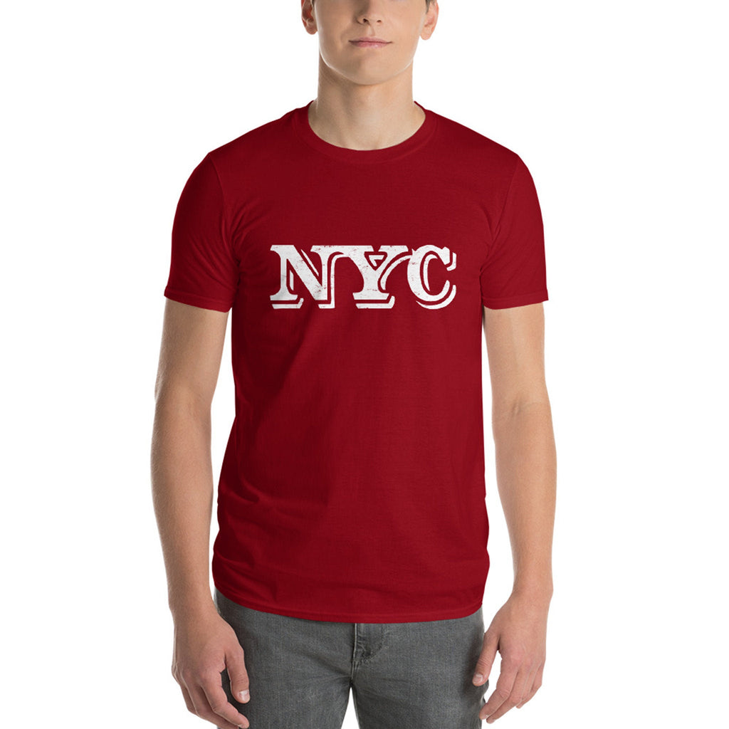 Stylish, fashionable graphic t-shirt, with classic, retro / vintage-inspired bold typography that reads "NYC" in a shadowfont. 