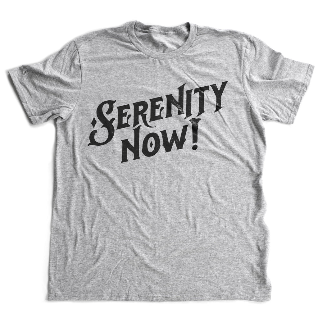A stylish, retro-design graphic t-shirt featuring the sarcastic, parody exclamation from Seinfeld tv episodes from Frank Costanza: "Serenity Now!"