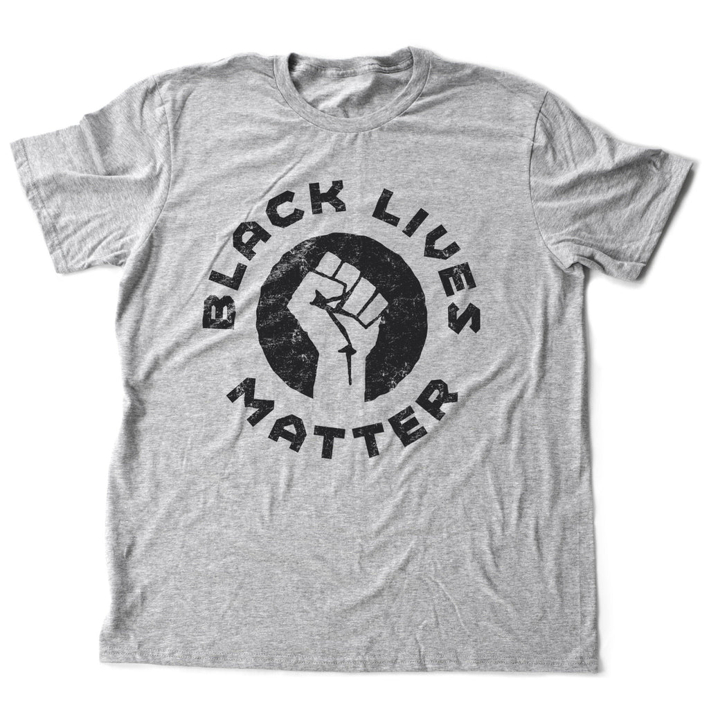 Retro design graphic t-shirt honoring the Black Lives Movement of 2020, featuring the iconic raised Fist, and the words "Black Lives Matter" in a circle around it.