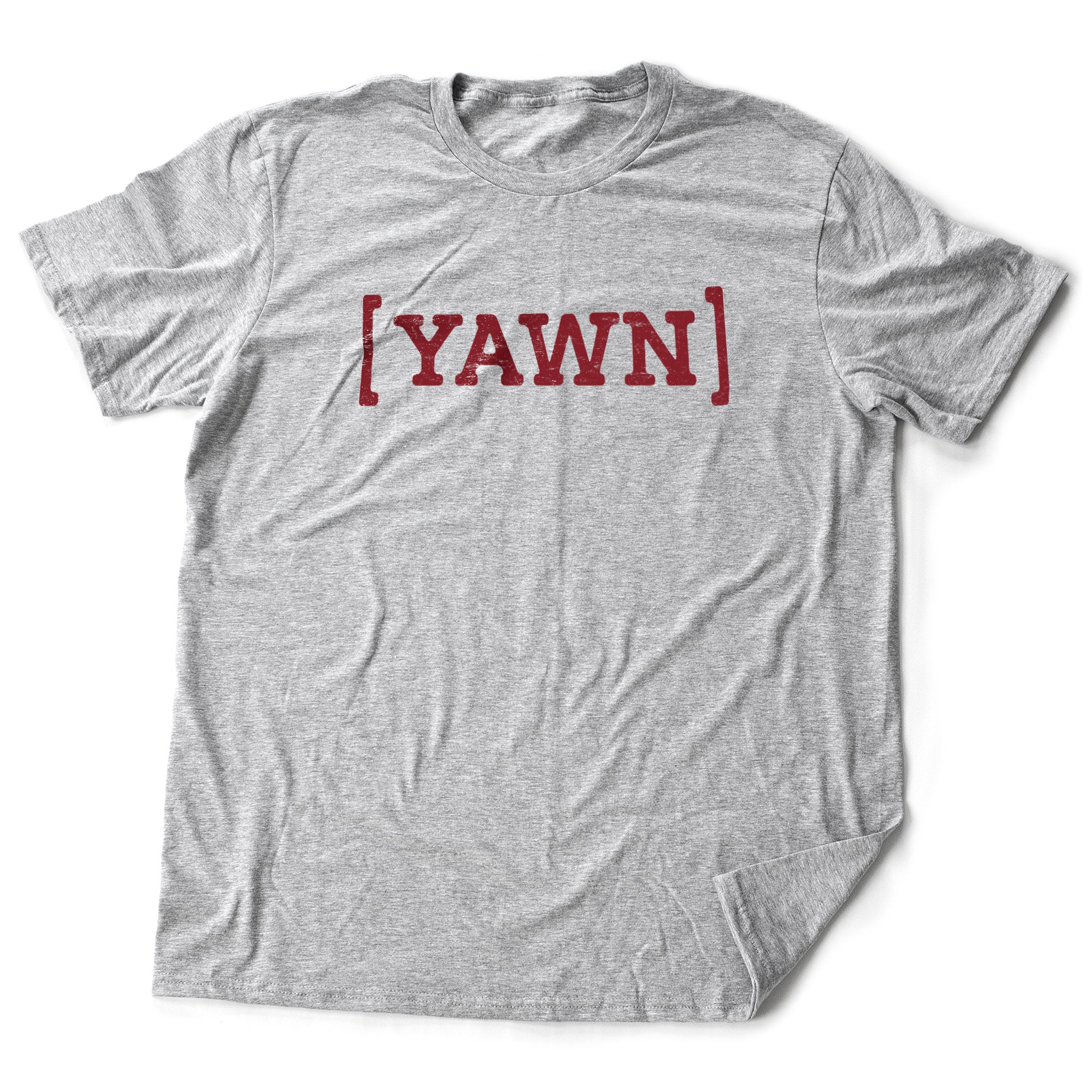 A sarcastic graphic t-shirt proclaiming the user as too bored to give a damn, with the parenthetical "YAWN" in bold typography.